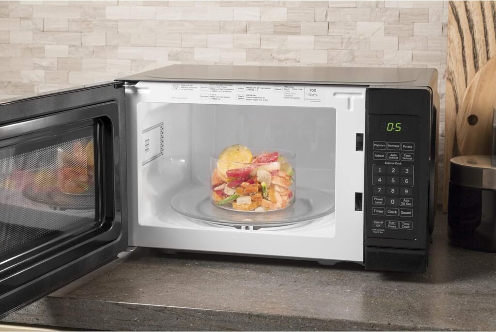 GE Countertop Microwave Oven | 0.7 Cubic Feet Capacity, 700 Watts | Kitchen Essentials for the Countertop or Dorm Room | Stainless Steel